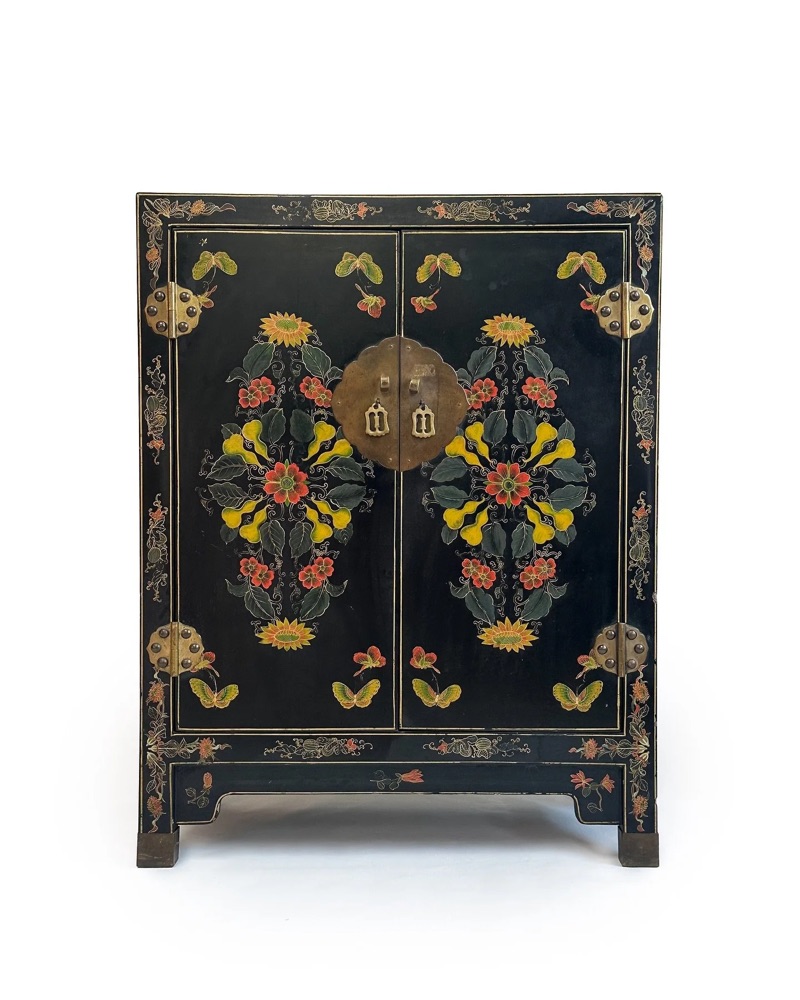 A small, charming vintage Chinese export cabinet in black lacquer, symmetrically decora…